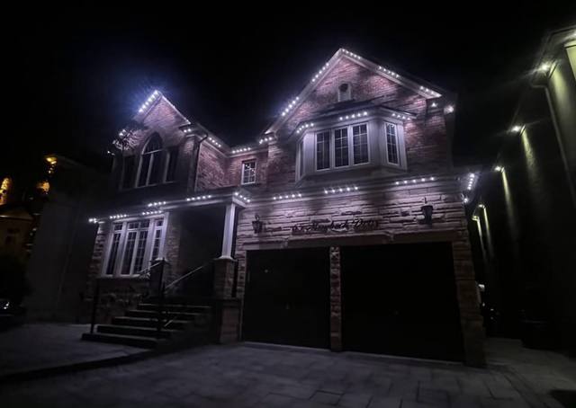 Home with warm white permanent architectural LED lighting